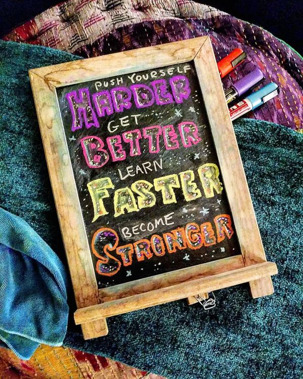 Chalkboard: Push yourself: Harder, Better, Faster, Stronger.